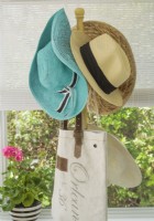 A coat rack offer streamline storage for hat and bags.