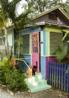 The color of the back porch entry evokes the cottages of Key West.