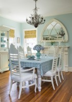Chalk paint unifies and refreshes the dining table and 1960s chairs.