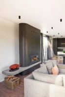 Fireplace with tile cladding in living room