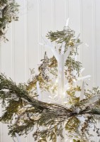 Detail of white wooden Christmas tree