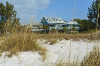 The sprawling cottage seen from the beach.