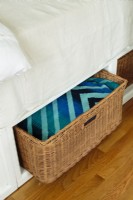 On the side of the bed, baskets help keeping the small 