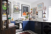 Kitchen with artwork on walls