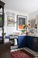 Kitchen with artwork on walls