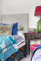 Colourful guest room bed