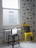 Cassette themed privacy film on sash window