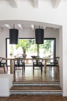 Modern country dining room with sliding doors to terrace