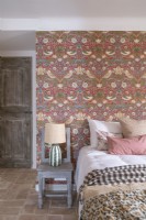 Floral feature wall in country bedroom