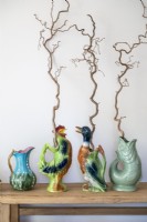 Detail of colourful decorative vintage ceramic jugs