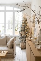 Christmas tree in neutrally decorated living room