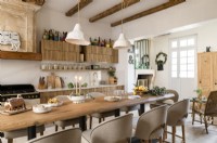 Modern country kitchen diner decorated for Christmas
