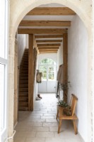 Country entrance hall and corridor to staircase