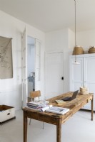 White painted study with rustic wooden desk