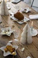Christmas decorations and white accessories on wooden table