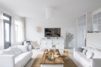 White painted living room with Christmas decorations