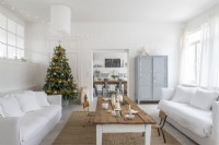 White painted modern country living room decorated for Christmas