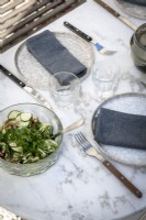Detail of salad on outdoor dining table