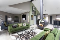 Central wood burning stove in contemporary open plan living space