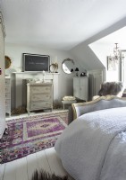 Antique furniture in eclectic classic style bedroom