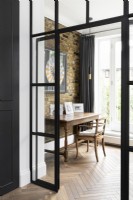 View into home office through crittall style doors.