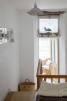 Sally and John Biddle's house in Cornwall, upstairs, landing detail, with view through into bedroom