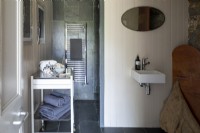 Modern wet room, with tongue and groove wall, chrome towel rail