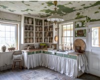 Rustic kitchen with green and white distressed painted walls