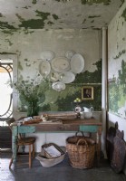 Distressed painted walls in rustic kitchen