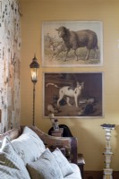 Vintage paintings on wall of eclectic living room
