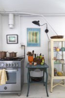 Eclectic freestanding furniture in country kitchen