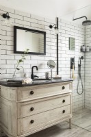 Distressed sink unit in black and white modern classic style bathroom