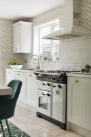 Modern range cooker in neutrally decorated kitchen