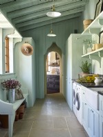 A country style blue laundry and utility room