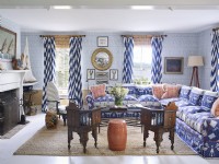 A Maine island cottage living room with antiques, nautical style and water views.
