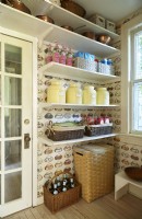 Open shelving pantry with teacup wall paper