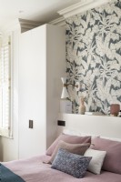 Bedroom makeover with built in wardrobe and wallpaper feature wall.