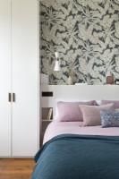 Bedroom makeover with built in storage and wallpaper feature wall.