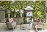 Ivy trompe l’oeil wallpaper and mirror in garden room