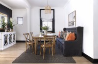 Dining room with deep-buttoned banquette seating