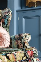 Bold botanical velvet patterned wingback armchair