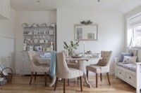 Christmas white dining room with painted furniture