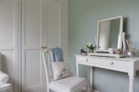 White and duck egg blue bedroom with dressing table
