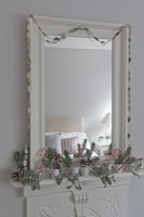 Christmas bedroom detail shot with garland and candy canes