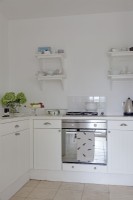 Classic white kitchen with shelves 
