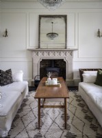 Drawing room with coffee table and fireplace