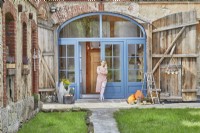 Country style home with large blue doors