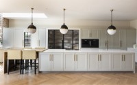Modern classic kitchen with large kitchen island and ladder. 