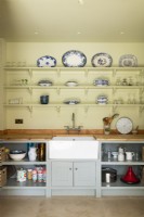 Classic country pantry larder with shelves and Belfast sink.