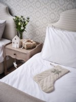 Neutral bedroom with stocking and Christmas details